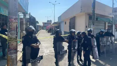 Hallan fosa clandestina con restos humanos en Mercado Morelos de Puebla