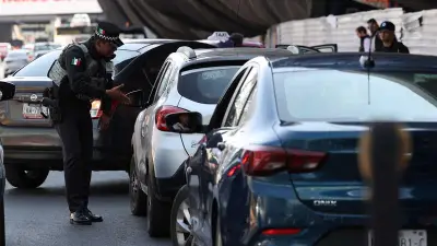 Guardia Nacional inicia operativos para multar taxis de app sin permiso en el AICM