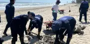 Derrame de hidrocarburo activa contingencia en playas de Veracruz; Semar lidera operativo