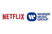 Netflix y Warner Bros. Discovery Forjan Alianza Estratégica para Producciones Musicales