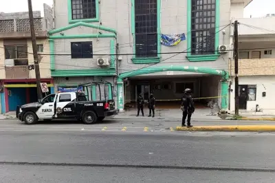 Hallan cuerpo sin vida en cochera junto a Fiscalía de NL