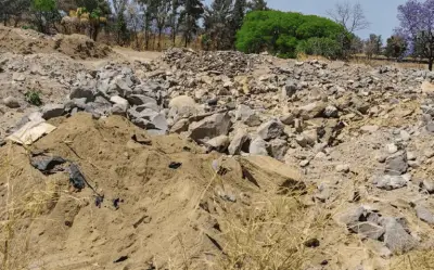 Hallan siete bolsas con restos humanos en terreno en construcción de Tlajomulco, Jalisco