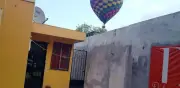 Globo aerostático realiza aterrizaje de emergencia en zona residencial de Montemorelos