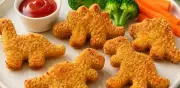 Nuggets de pollo y verduras en forma de dinosaurio para el Día del Niño