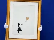 Banksy subastará óleo 'Girl and Balloon' en Nueva York por hasta 18 mdd