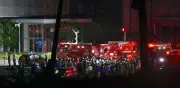 Rescatan a cuatro personas bajo escombros de centro comercial en Kumamoto